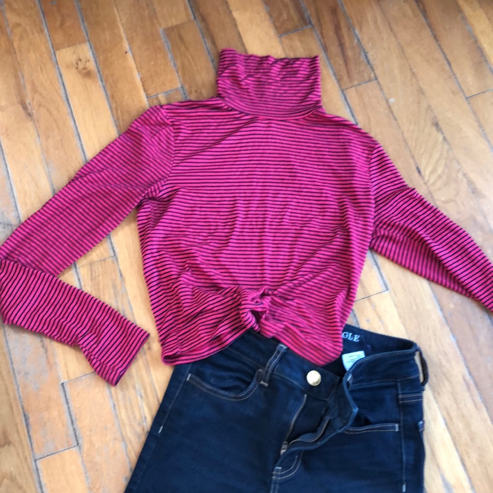 Red and black turtleneck top